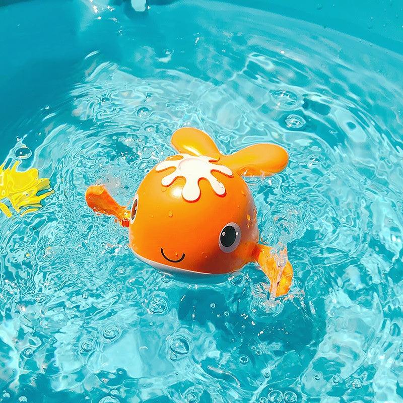 Children's floating bath toy in bright water.