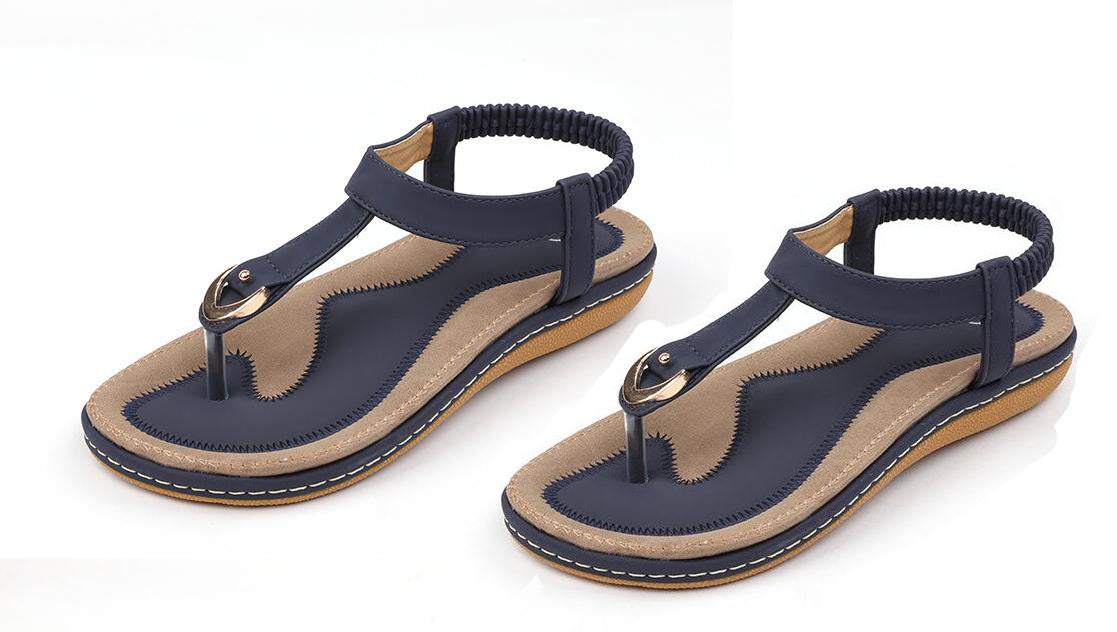 Fashionable women's summer sandals with ankle strap, low heel, and rubber outsole.