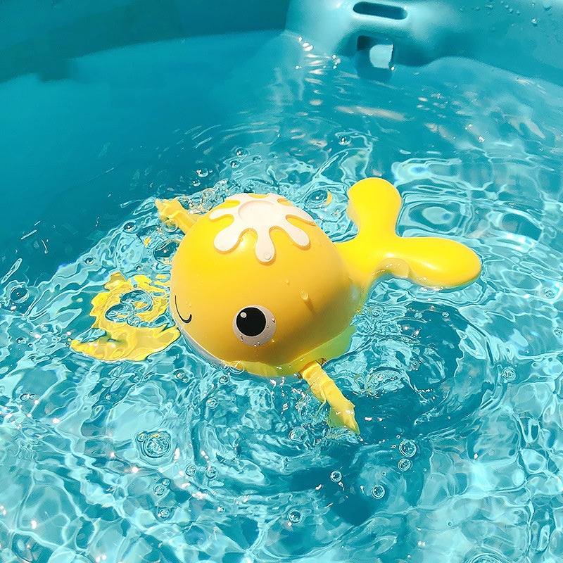 Yellow floating toy for children's bath time with clockwork feature.