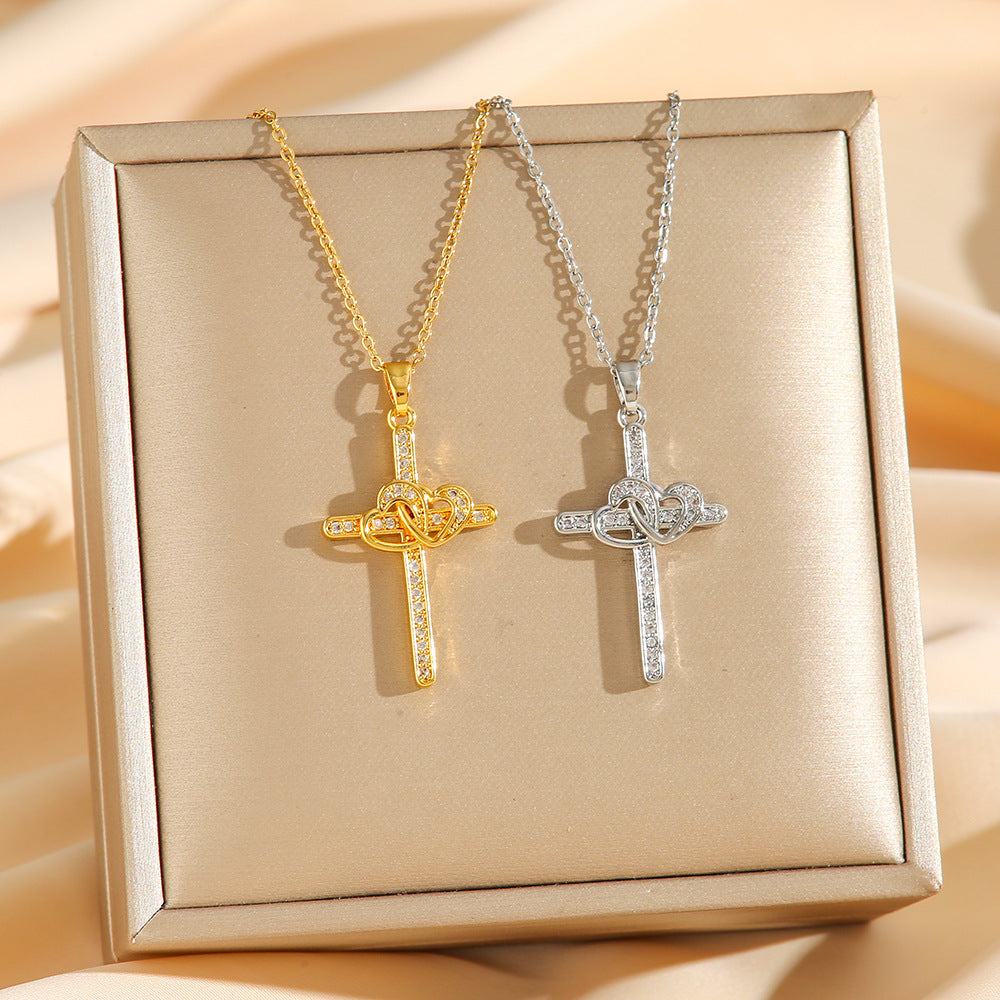 Gold and silver cross necklaces with double ring heart pendants for women.