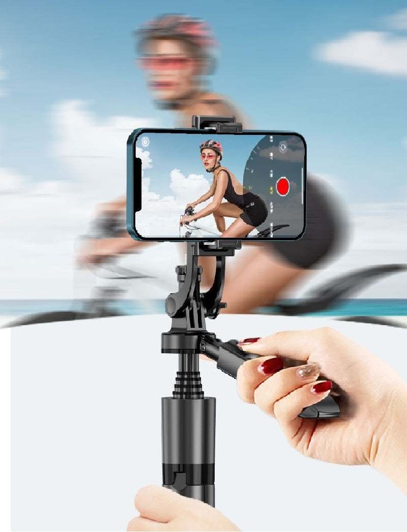 360 Auto Face Tracking gimbal stabilizing a smartphone while capturing a cyclist.